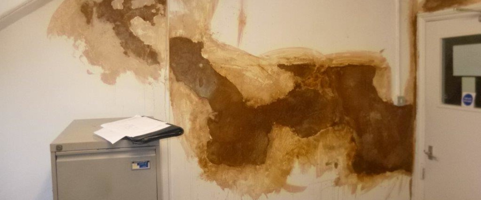 What happens to plaster walls when they get wet?