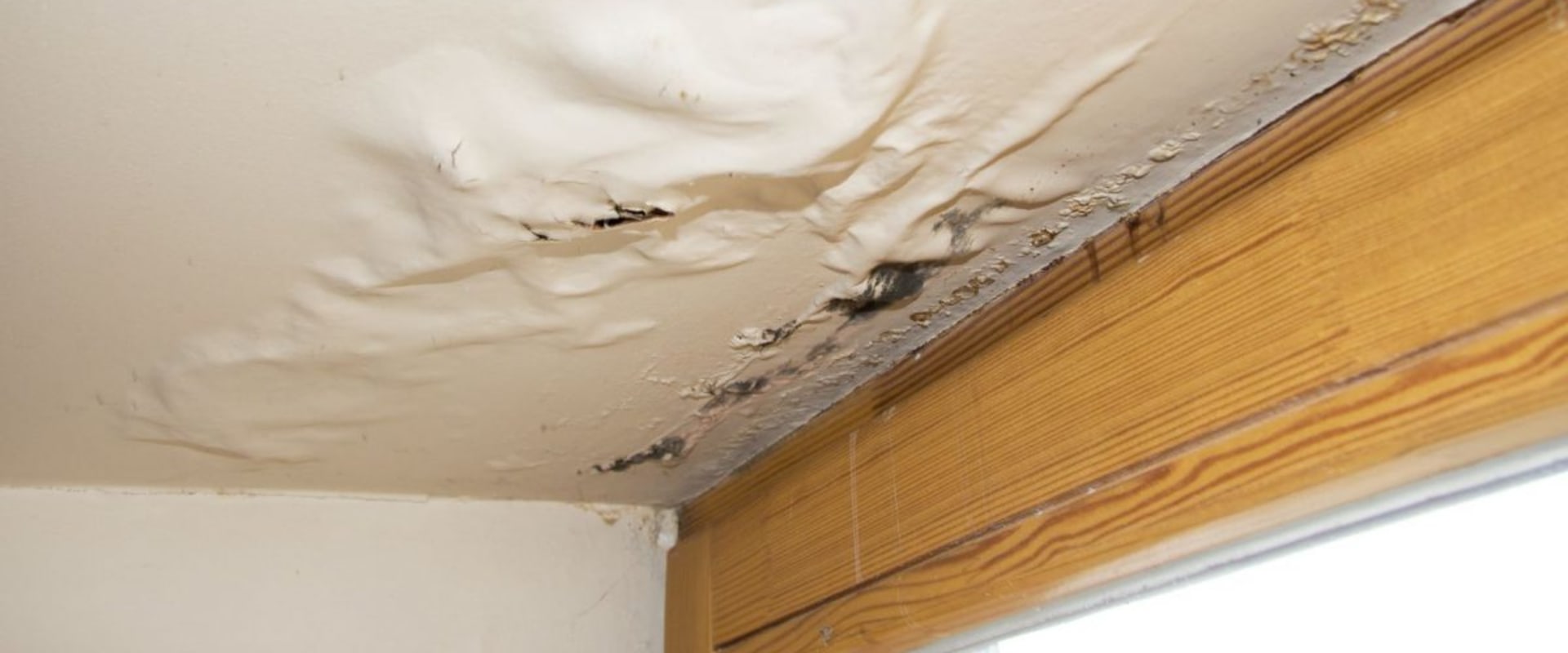 How do you check for water damage in walls?